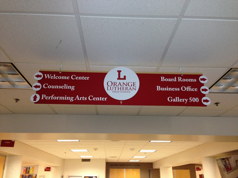 Hanging directional signs for schools in Orange County