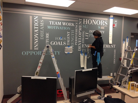 How are wall graphics installed in Orange County