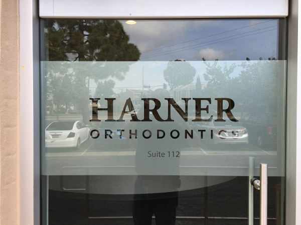 Door and window graphics for dental offices in Orange County CA