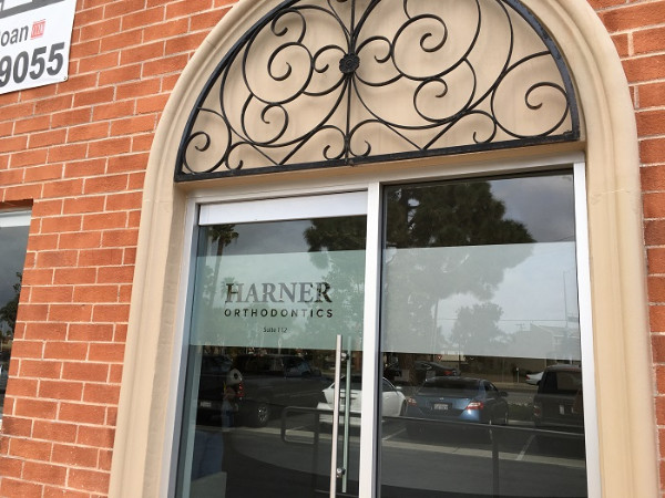 Etched vinyl window graphics for dental offices in Orange County CA