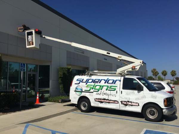 Exterior Sign Installation with Aerial Bucket Van in Buena Park CA