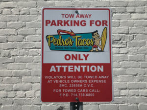 Parking signs for restaurants in Fullerton CA